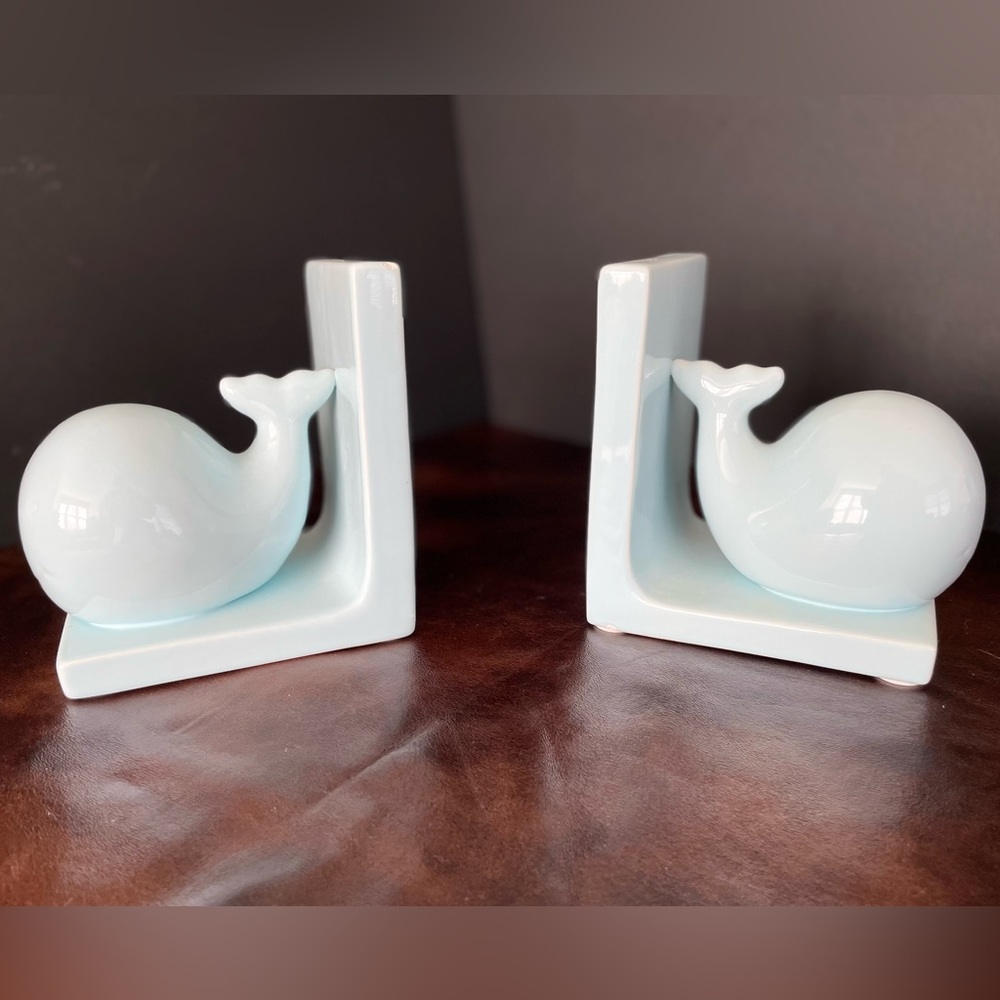 White ceramic whale bookends